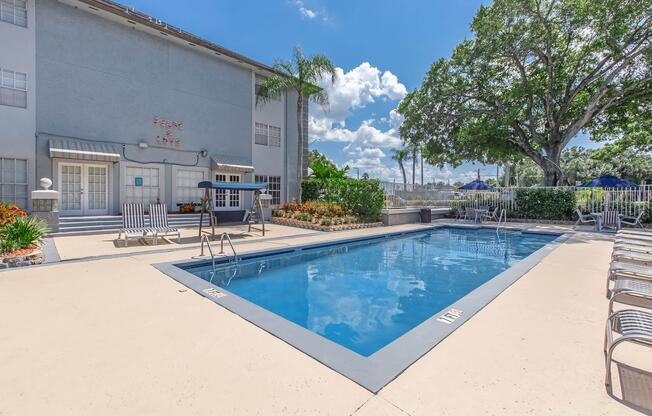 a pool next to a building