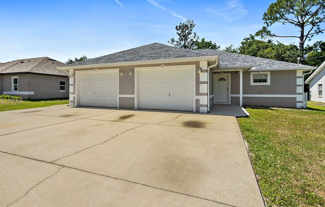 Spacious 3 Bedroom 2 Bath Duplex in Pine Grove neighborhood of Palm Coast