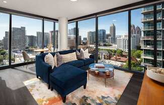 Living room area with view and couch at 903 Peachtree, Atlanta, GA