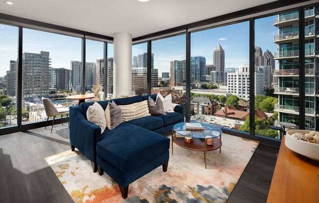 Living room area with view and couch at 903 Peachtree, Atlanta, GA