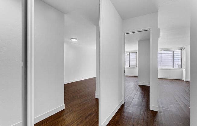 a view of the living room and dining room from the kitchen