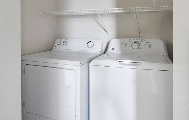 a washer and dryer in a laundry room