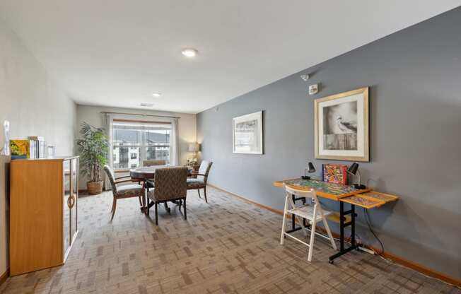 an open living room and dining room with a table and chairs