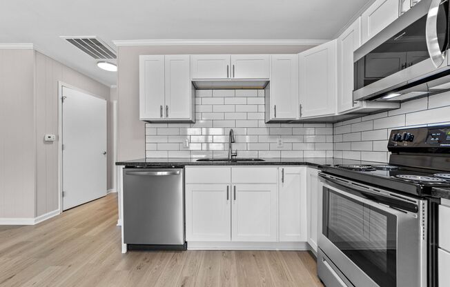 Newly Renovated Flats & Townhomes in the Heart of Angier! Pets Welcome!