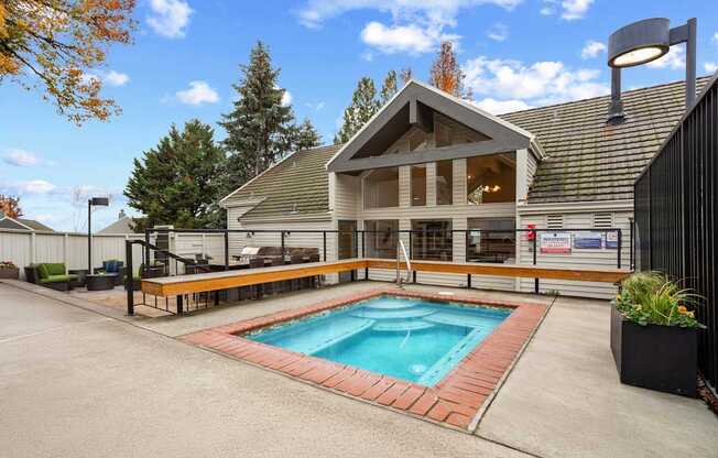 A house with a pool in the backyard.