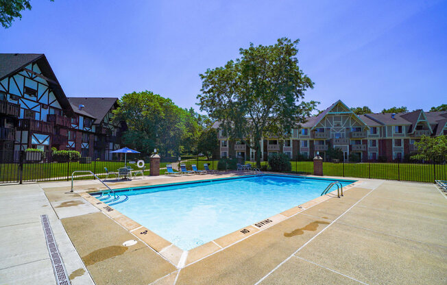 Outdoor Pool with Large Sundeck at Swiss Valley Apartments, Wyoming, 49509
