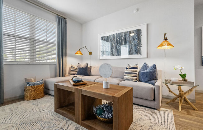 a living room with a couch and a coffee table