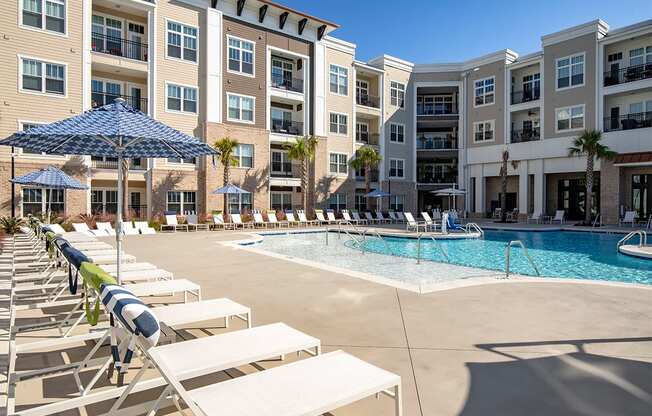 Sparkling pool with sun loungers at Central Island Square, South Carolina