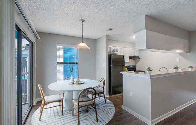 Separate Dining Area With Wood-Style Floors