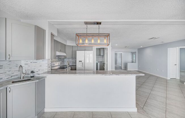 3/2 Just Steps to the Intercoastal with Boat Ramp and Dock