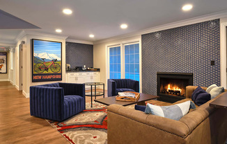 Resident Lounge With Fireplace at Heritage at the River, Manchester, 03102