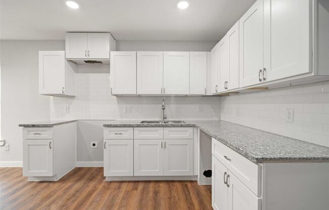 This newly constructed 3-bedroom, 2-bathroom unit offers modern living with 1,150 sq ft of space. Features include fairly new appliances, an open-concept design, and a spacious backyard perfect for outdoor activities. Located in a peaceful neighborhood, i