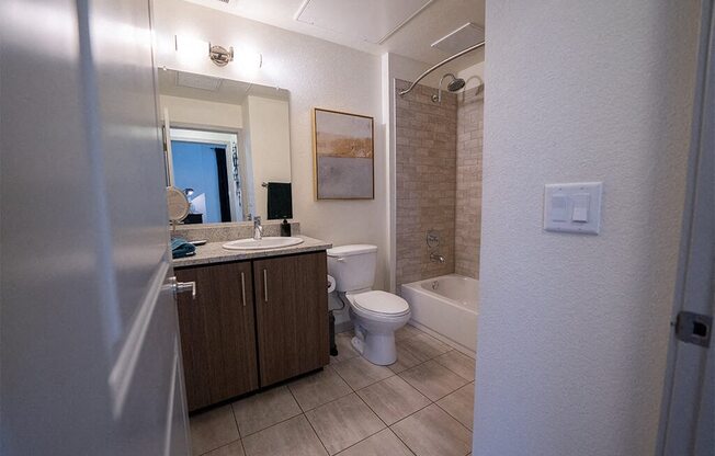 a bathroom with a toilet and a sink