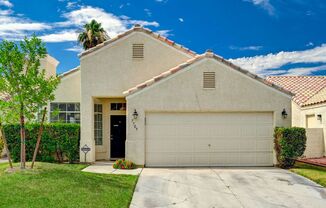 Single Story Home in Northwest Las Vegas with nicely Shaded Real Grass backyard and Community Pool