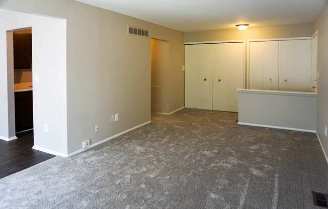 Spacious open living room at Riverstone Apartments in Southfield, Michigan