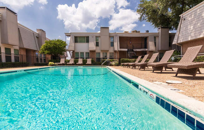 This is a photo of the pool area at Woodbridge Apartments in Dallas, Texas.