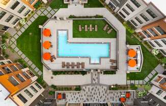 arial view of a swimming pool in the middle of a building