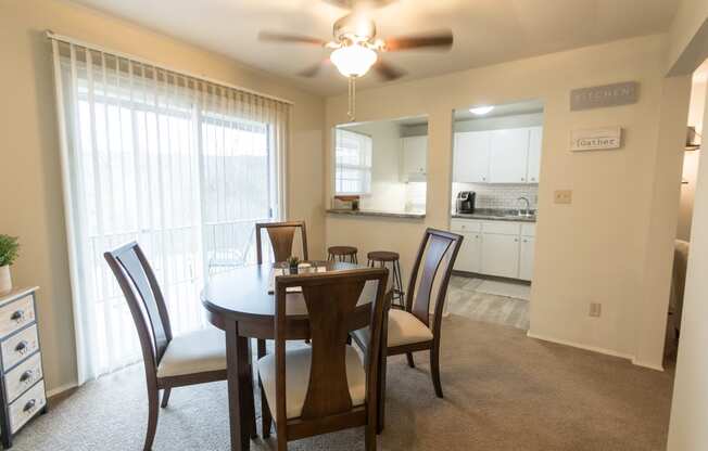 This is a photo of the dining room of the 1 bedroom, 631 square foot model apartment at Lake of the Woods Apartments in Cincinnati, OH.