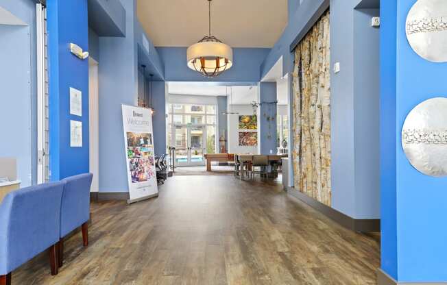 clubhouse with wood flooring at Westlink at Oak Station Apartments in Lakewood, CO