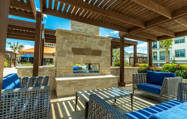 Pool side sitting area at Parkat Bayside, Texas, 75088