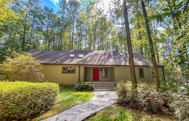 Spacious Contemporary Home in a Private Wooded Setting