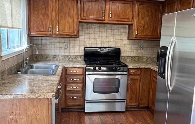 Corner Lot with Large Deck and Cozy Backyard