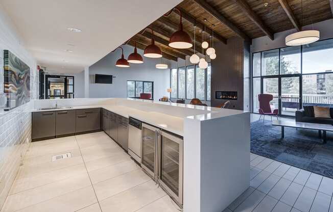 a large kitchen with a large counter top in a house at Ashford Belmar Apartments, Lakewood, CO