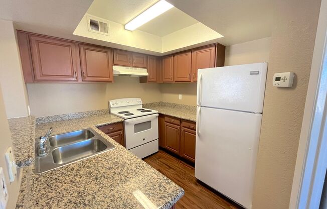 2 bed 2 bath 2nd floor condo unit in gated community w/pool and amenities