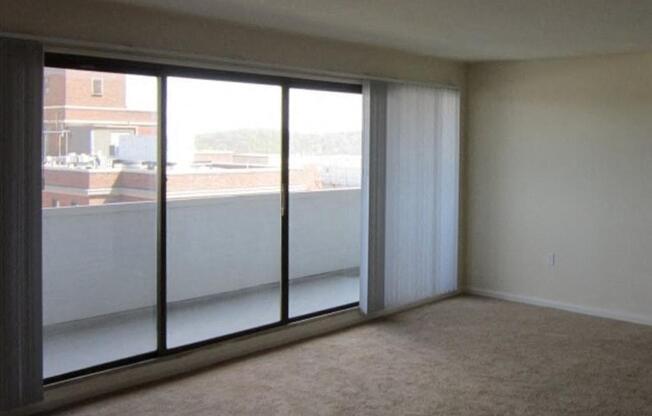 Floor to ceiling windows in the living space offer natural light and scenic views.