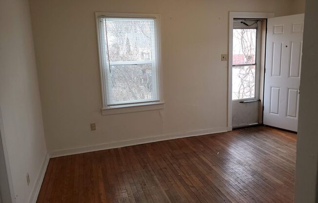 2 bd, 1 ba house, hardwoods, new paint, fenced with shed, w/d included, mowing provided, north central location near Business Loop