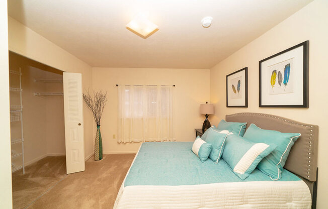 Carpeted Bedroom with Large Closet at The Highlands Apartments, IN