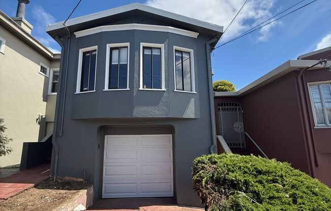 Bright Sunnyside Home with Fireplace, Bay Windows & Private Backyard!
