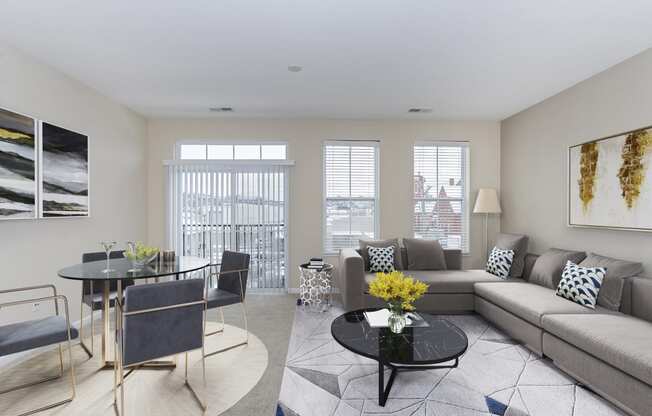 Living room with sofa at Monmouth Row Apartments, Newport, KY