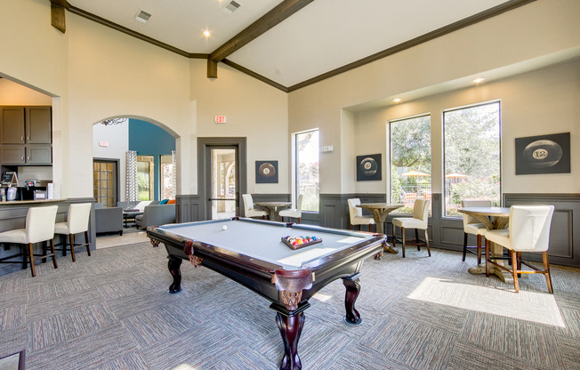 View of Billiards Room, Showing Pool Table, Coffee Bar, Tables and Chairs at Enclave on Golden Triangle Apartments