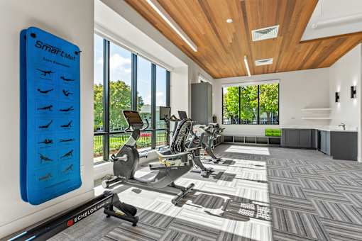 A gym with a blue poster on the wall.