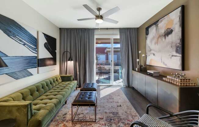 Living room decor with ceiling fan and light at Zaterra Luxury Apartments, Arizona