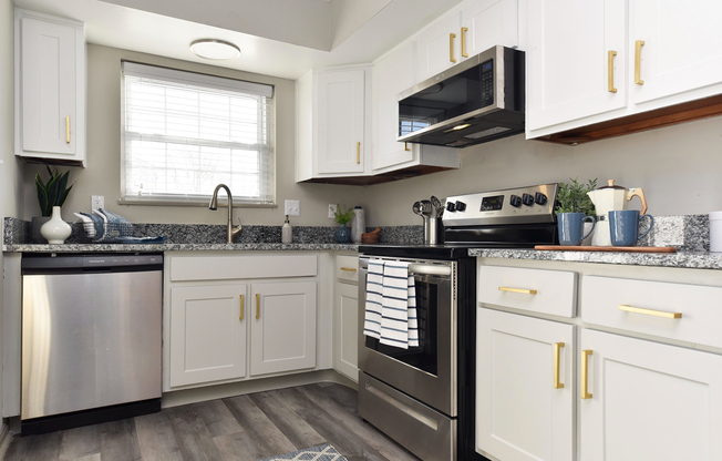 Experience the sleek elegance of this modern kitchen, designed with style and functionality.