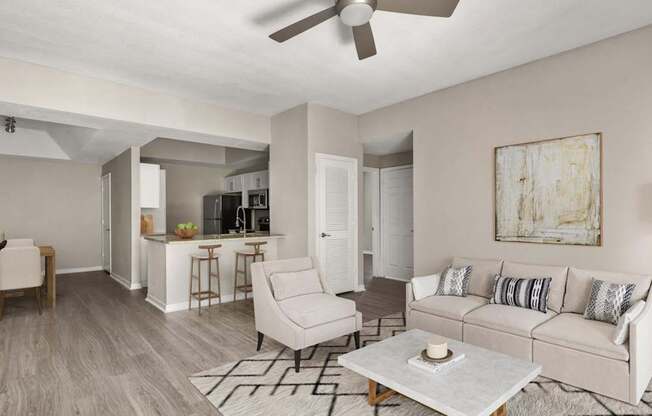 A living room with a white couch and a coffee table.