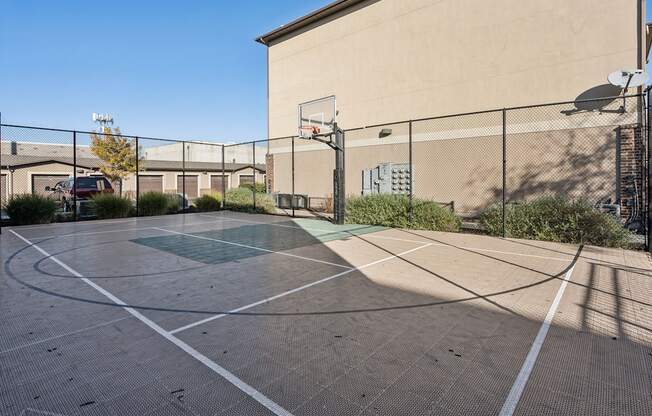 the basketball court at the enclave at university heights apartments ut