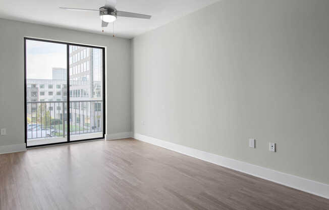 Living Room with Balcony and Hard Surface Flooring