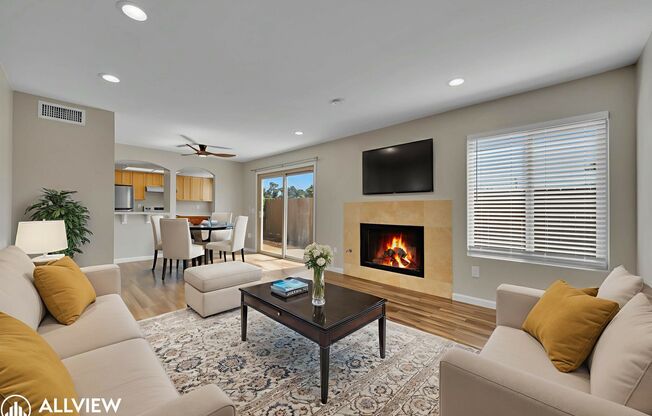 Beautifully Renovated 2-Bedroom Corner Townhome in Gated Community With Modern Upgrades
