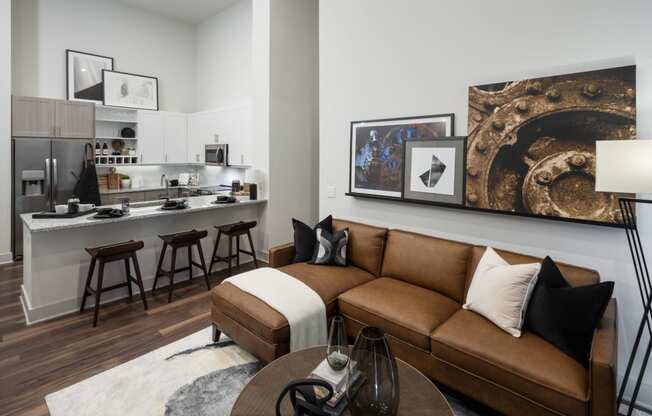 Living Room With Gourmet Kitchen View at Berkshire Pullman, Frisco, TX, 75034