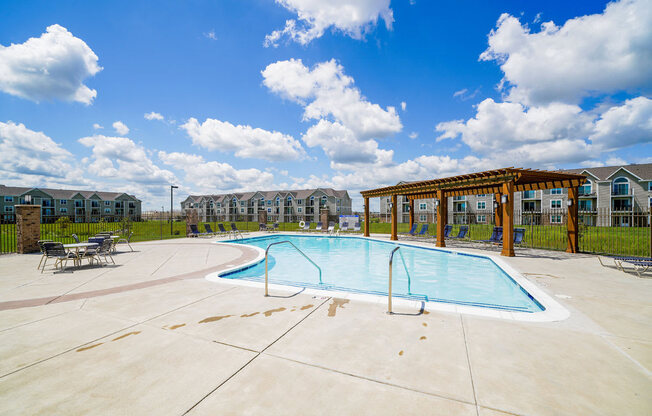 Outdoor Pool with Pergola at Stoney Pointe Apartment Homes, Wichita, KS