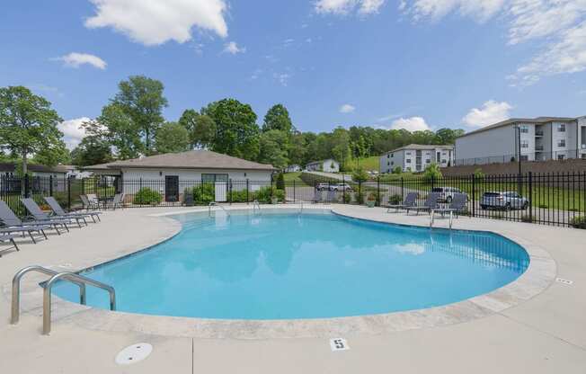 our apartments have a resort style pool with chaise lounge chairs