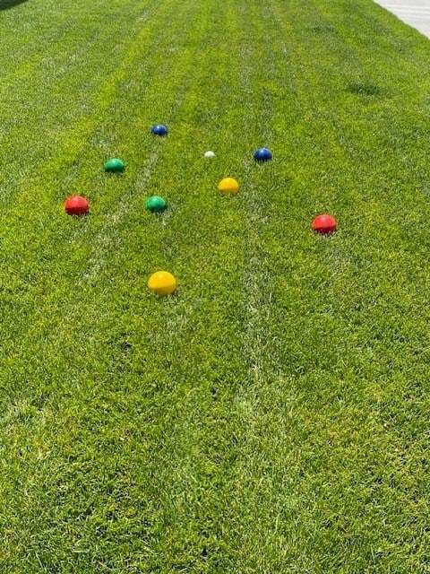 a group of colored balls in the grassat Westbury Apartments, Rancho Cucamonga, 91739