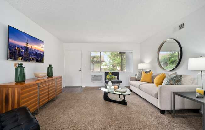 a living room with a couch and a coffee table