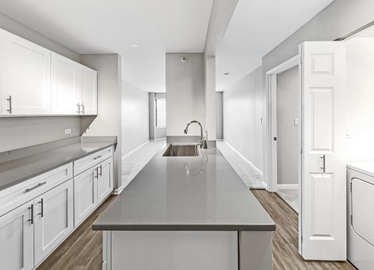 Kitchen Islands At Iroquois Club Apartments In Naperville, IL