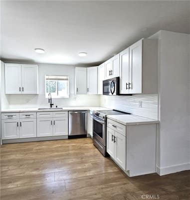 961 W 21 ST