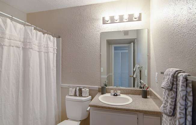 Model Bathroomat Woodmere Trace Apartments in Duluth, Georgia, GA 30096