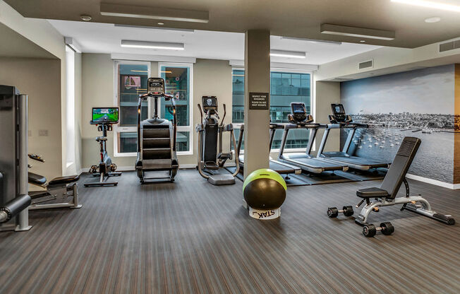 Fitness Center With Yoga/Stretch Area at AV8 Apartments in San Diego, CA